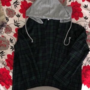Plaid shirt with gray hoodie
